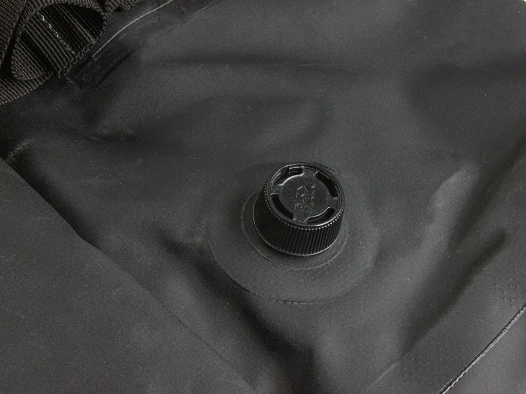 Detail of air-pressure release valve on Typhoon Bag, ensuring a watertight seal for all-weather protection.