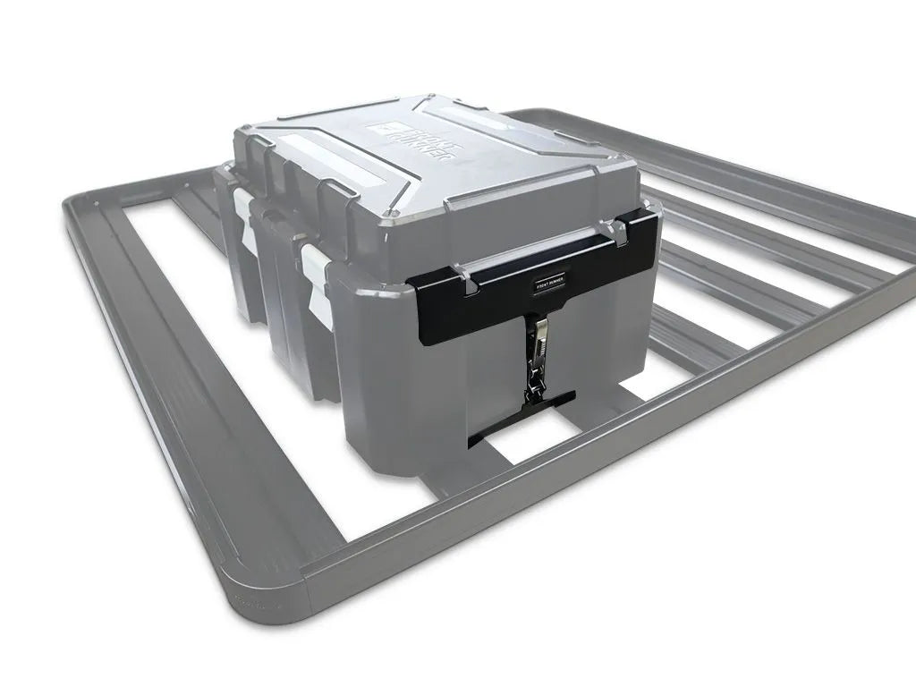 Installation hardware and mounting bracket securing Wolf Pack Pro container on a vehicle roof rack, ready for rugged terrain.