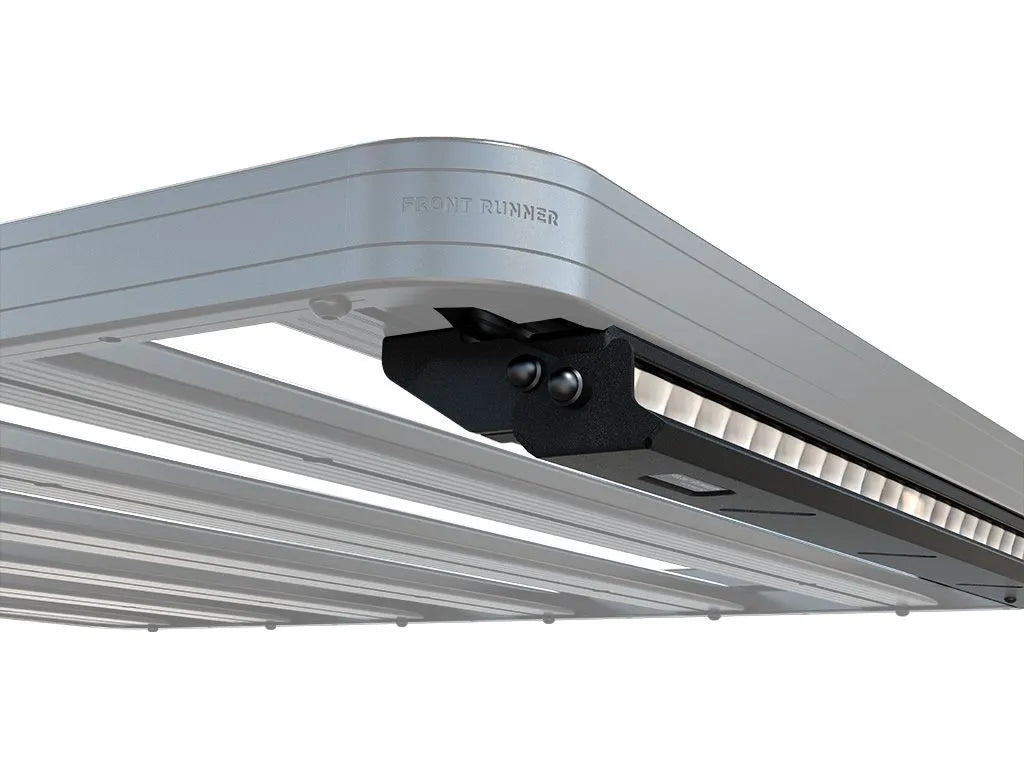 Front Runner 40" LED Light Bar with Off-Road Performance Shield mounted on a Slimline II Roof Rack, illuminating rugged terrain at night