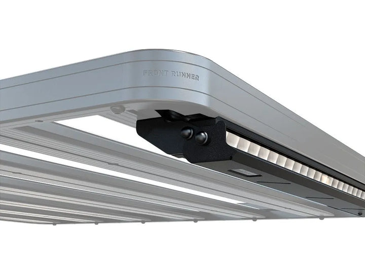 Front Runner 40" LED Light Bar with Off-Road Performance Shield mounted on a Slimline II Roof Rack, illuminating rugged terrain at night