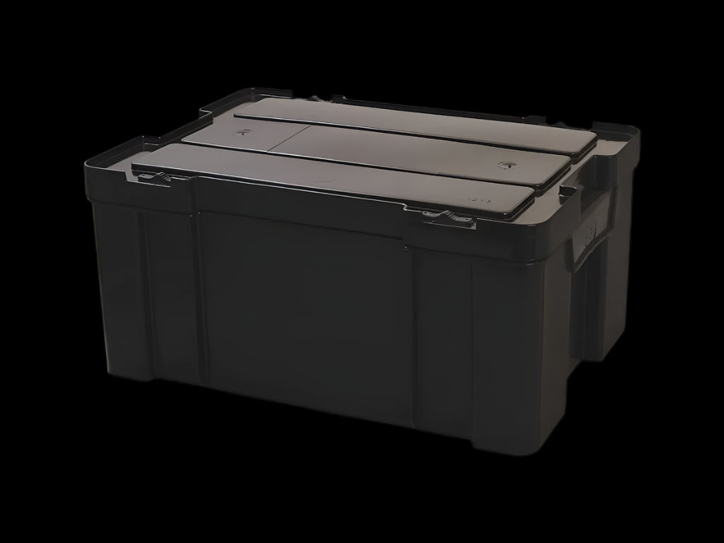 Close-up of Cub Pack’s durable high-density black plastic construction and integrated carrying grips.