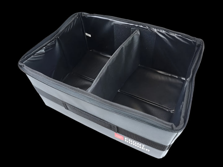 Front Runner Flat Pack storage box unfolded, showing adjustable vinyl-lined compartments for camping and overlanding gear